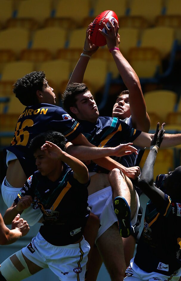 AFL 2013 Media - AIS AFL Academy v New Zealand Hawks Shem Tatupu marks for the New Zealand Hawks before being listed by Hawthorn - ${keywords}